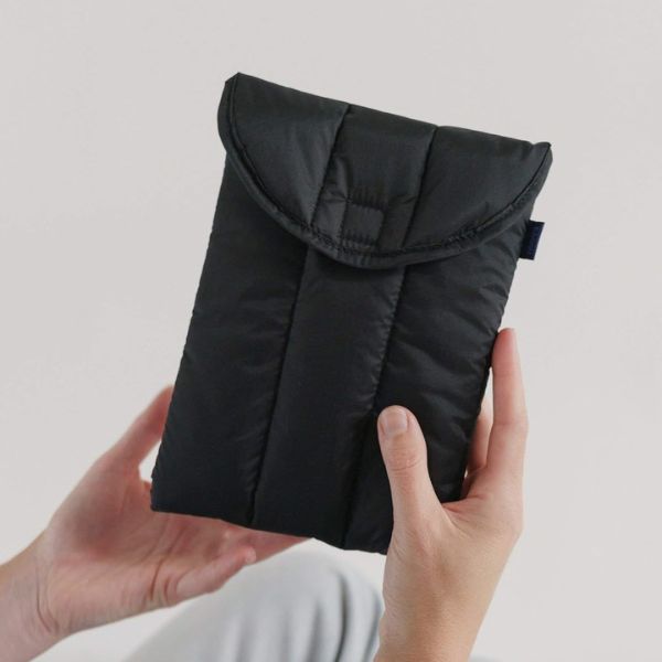 Puffy Tablet Sleeve, a stylish and protective case for her tablet.