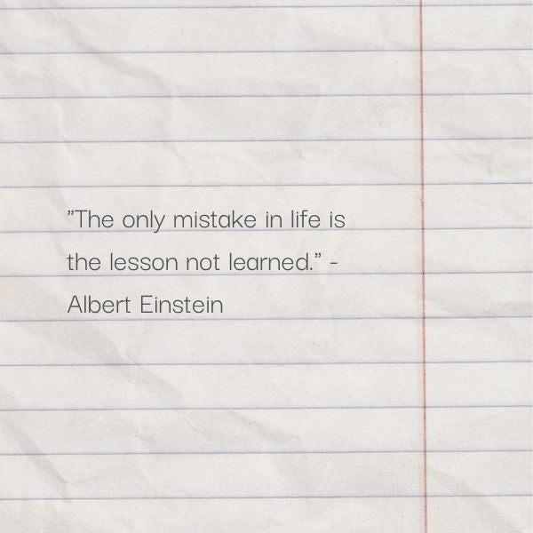 Einstein's quote on a paper, imparting a life lesson on mistakes.