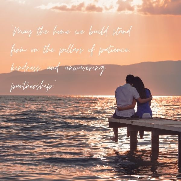 Couple sitting on a dock overlooking a sunset with a quote about a strong partnership