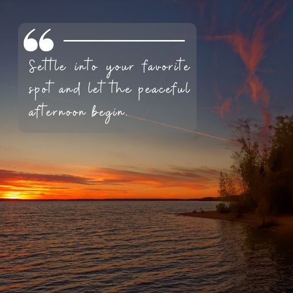 Sunset view over a lake with an inspiring quote about a peaceful afternoon.