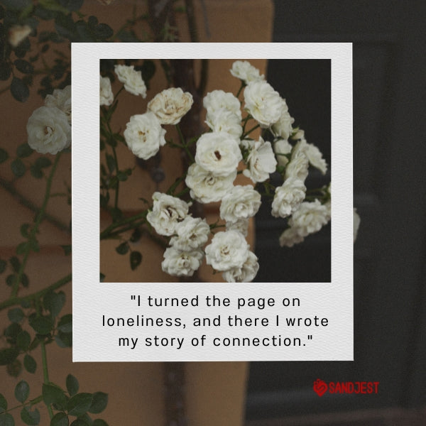 A book with white flowers, depicting quotes that express loneliness.