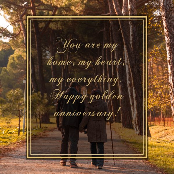 Senior couple walking hand in hand with 50th Wedding Anniversary quote.