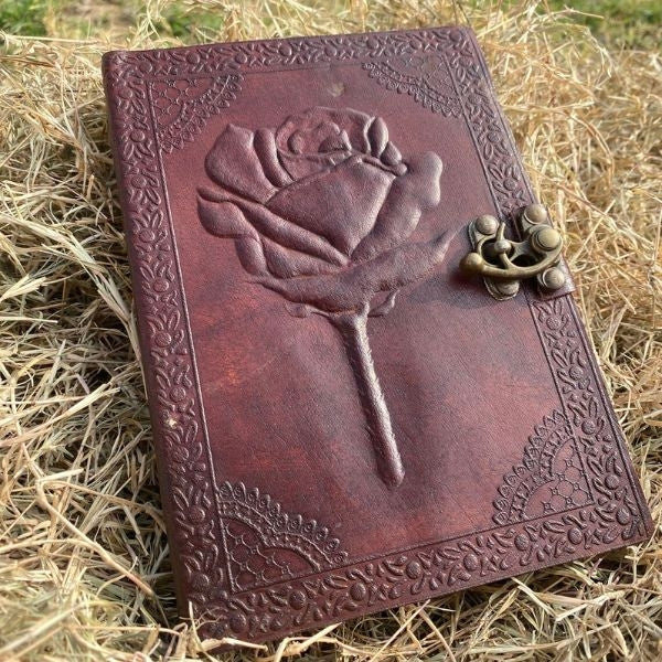 Rose Flower Leather Journal Diary Notebook - A beautiful rose flower leather journal diary notebook for jotting down thoughts and memories.