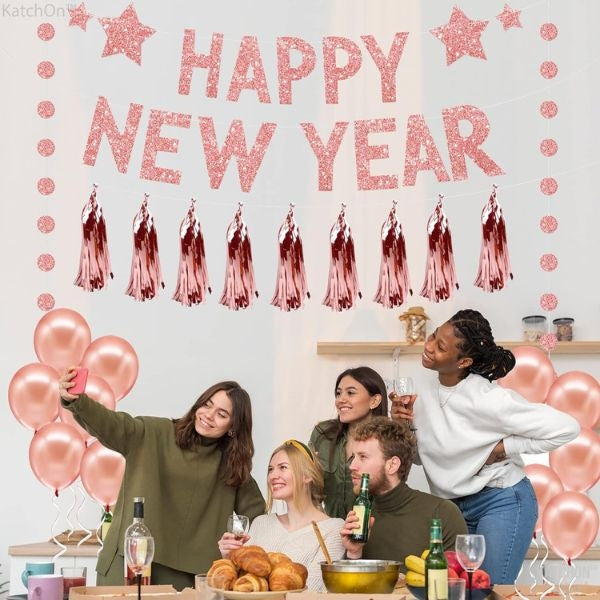 Rose gold glitter Happy New Year banner, festive decor as a New Year's Eve hostess gift.