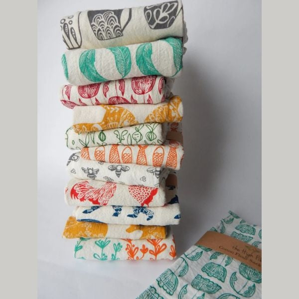 Set of Handmade Tea Towels is a thoughtful choice among housewarming gifts for couples, bringing charm to their kitchen.