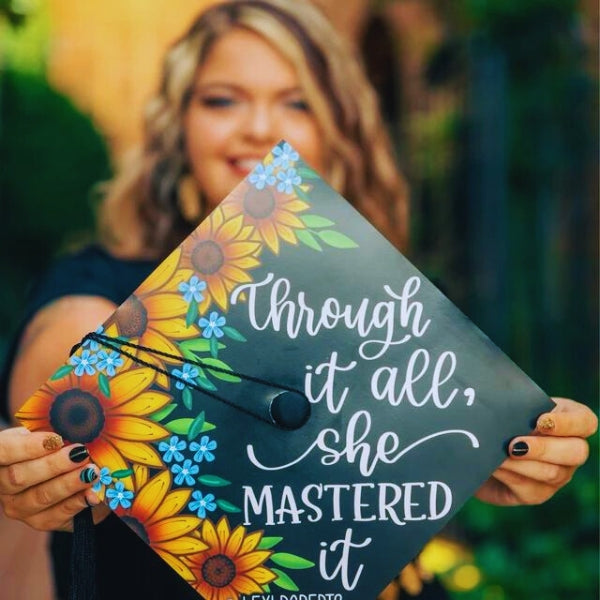 She Mastered It Graduation Cap showcases confidence and achievement.