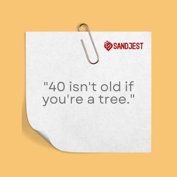 A playful note paper with a quote minimizing the age of 40 compared to a tree.