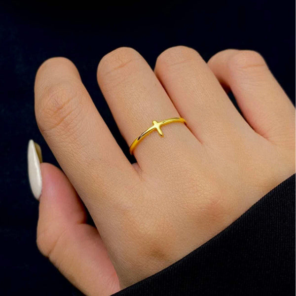 A sideways cross ring perfect for a mom who appreciates Christian symbolism in her jewelry