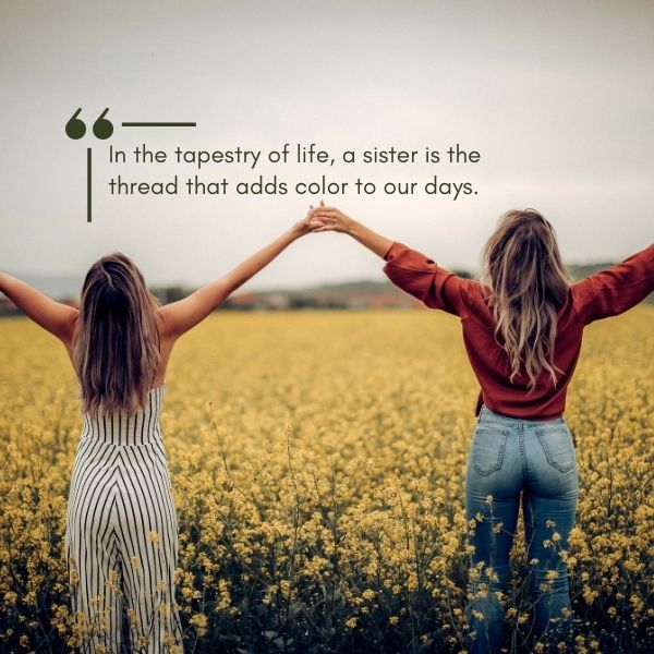 Two sisters holding hands with their backs to the camera in a vibrant yellow rapeseed field, with an inspirational quote about sisters adding color to life.