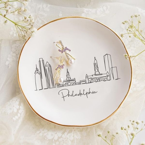 Skyline Ring Dish, an elegant graduation gift for her, featuring a skyline design and personalized name engraving.