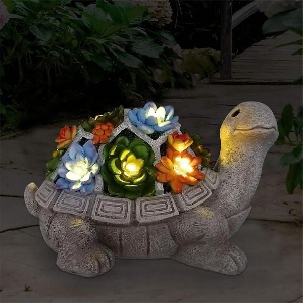 Solar-powered garden turtle statue, an eco-friendly gift for grandma's garden.