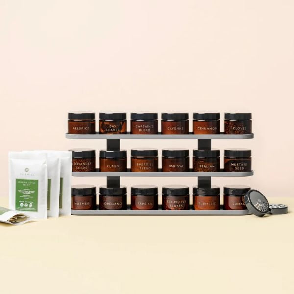 A Spice Set and Rack is a flavorful choice among housewarming gifts for couples, adding culinary inspiration to their kitchen.