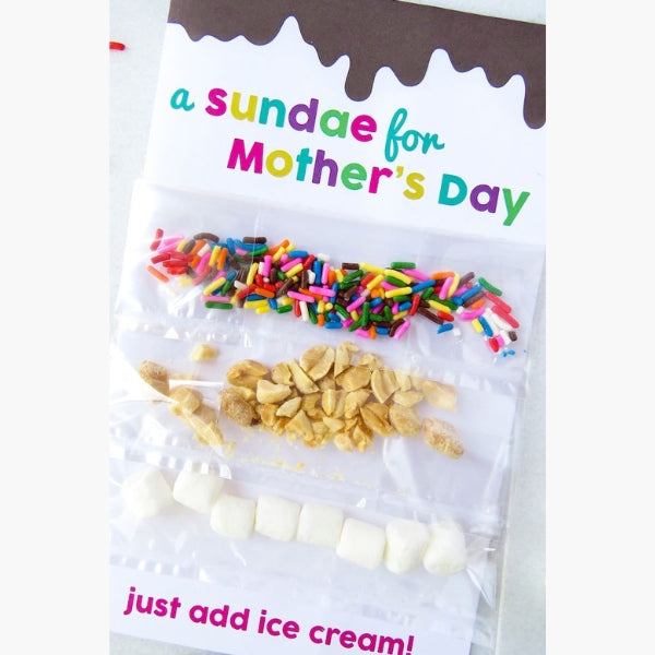 A Mother's Day card kit with toppings for making a sundae.