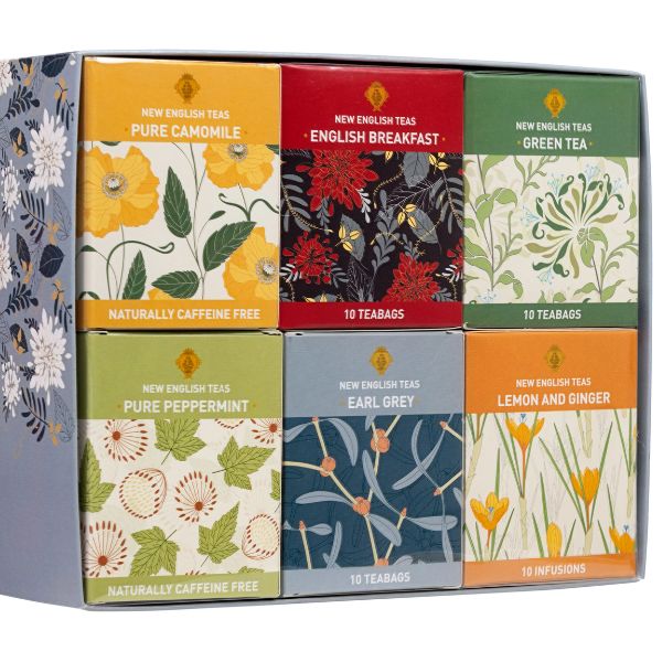 Tea Collection Gift Set is a perfect present for boyfriend mom, neatly arranged with an assortment of fine teas, accompanied by a vibrant teapot and cup.