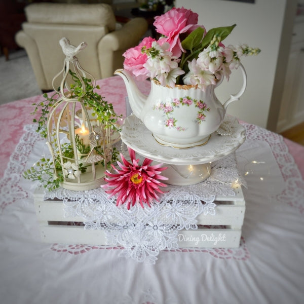Elegant tea time party setup as a refined 50th birthday idea.