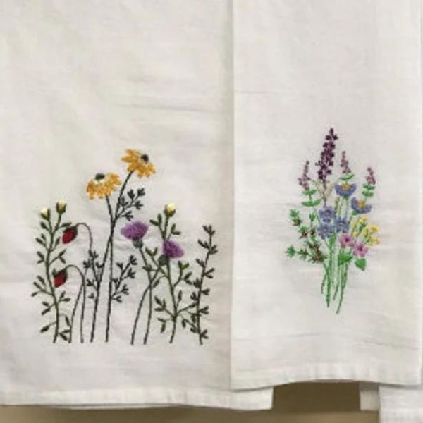 Tea Towels Wildflowers, adding a touch of floral charm to the kitchen as a 4 year anniversary gift.