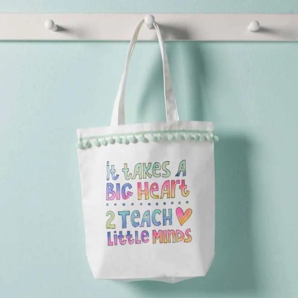 Carry a piece of art with you every day with the Teacher's Heart Watercolor Tote Bag.