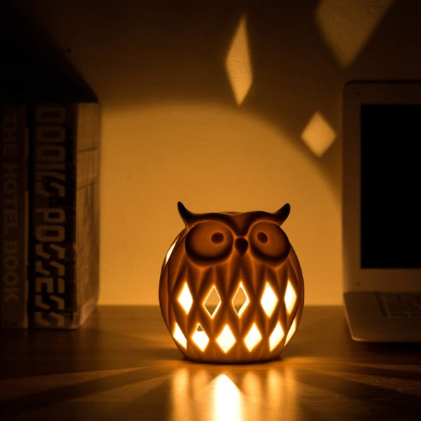 Tealight Candle Holder with owl motifs adds a serene ambiance to the collection of owl gifts