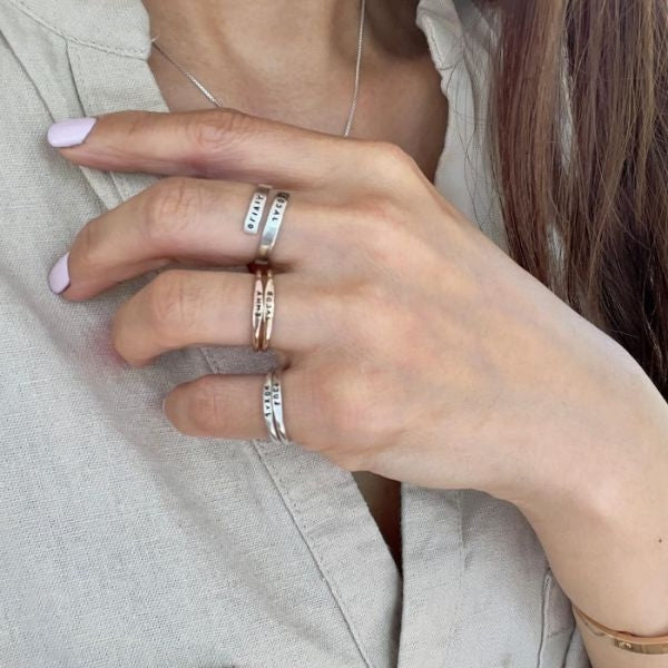 Teeny Tiny Stacking Sterling Silver Ring By Hannah Design is an elegant Mother's Day gift for mother-in-law.
