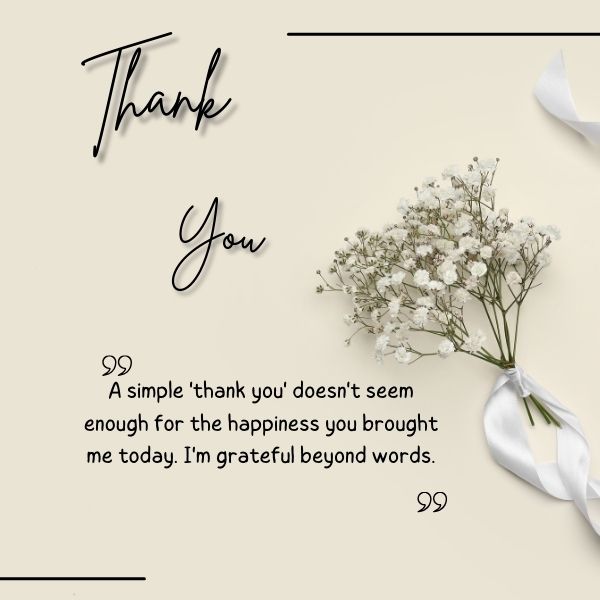 Elegant thank you card with white flowers and script font on a beige background