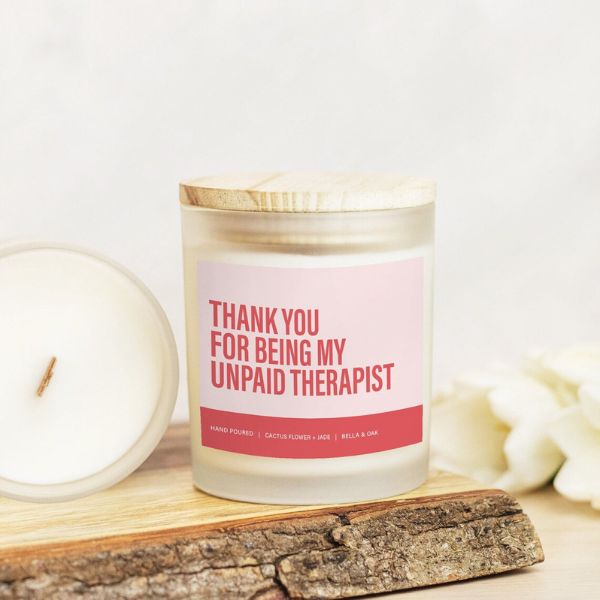 Show appreciation with a 'Thank You for Being My Unpaid Therapist' Candle - a humorous graduation gift.