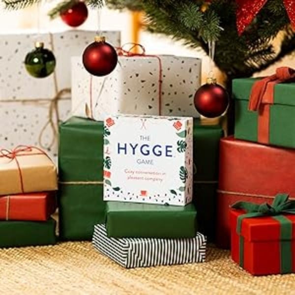 The Christmas Hygge Game, a cozy gathering of loved ones, embodying the essence of Christmas gifts for grandparents