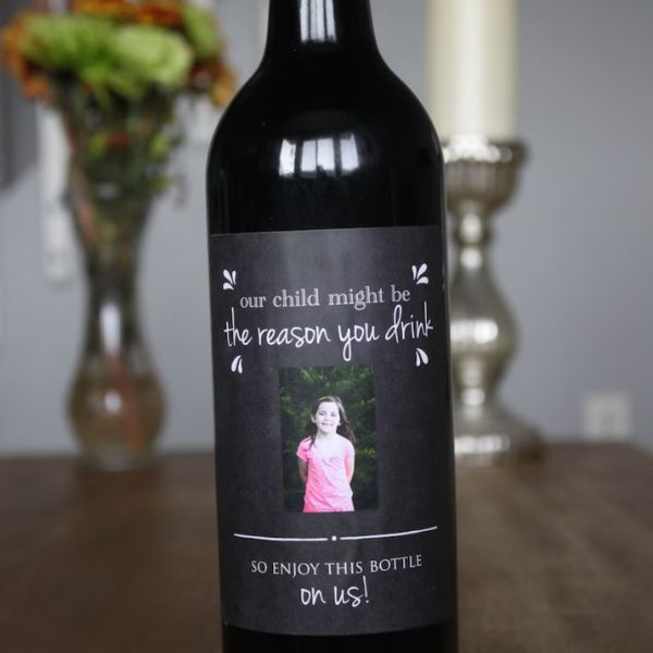 The Reason You Drink Wine Label, a playful and witty gift idea for daycare teachers.