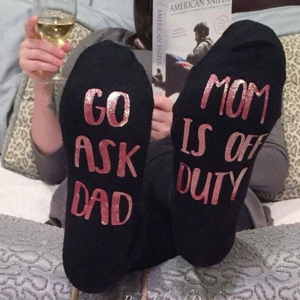 This Mom Is Off Duty' novelty socks for a funny Mother's Day surprise.
