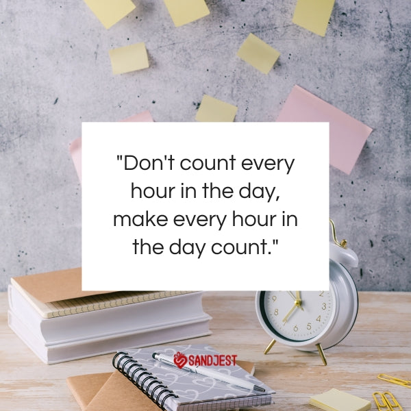 A workspace with a clock and a motivational quote about making the most of each hour.