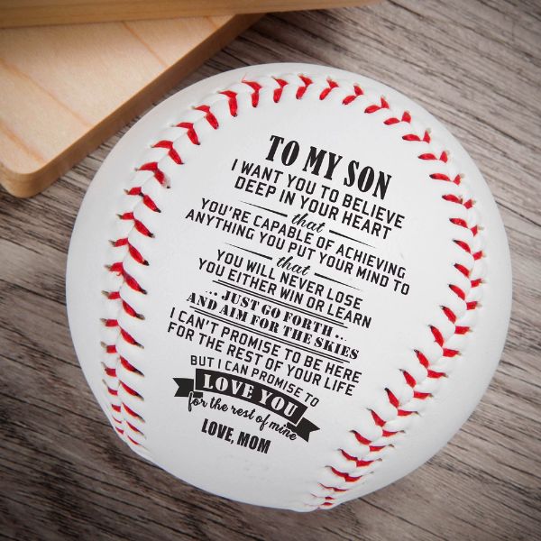 A custom baseball engraved with a heartfelt message, a unique gift for sons from their moms, encapsulating the enduring bond