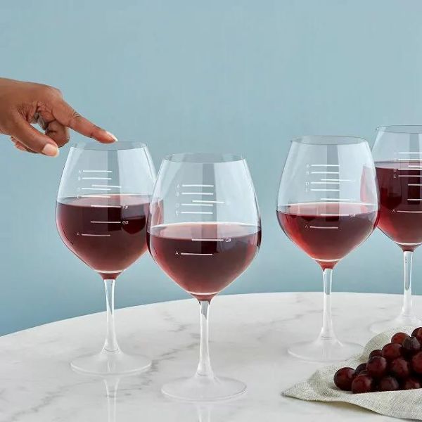 Uncommon Goods Major Scale Musical Wine Glasses, adding a harmonious twist to wine gatherings