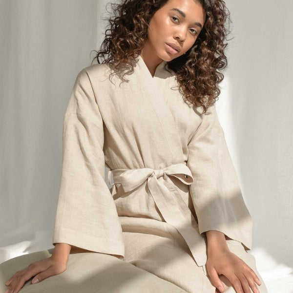A luxurious Under The Canopy Organic Short Lounge Robe, the perfect wedding gift for mom, ensuring she relaxes in style on her special day.