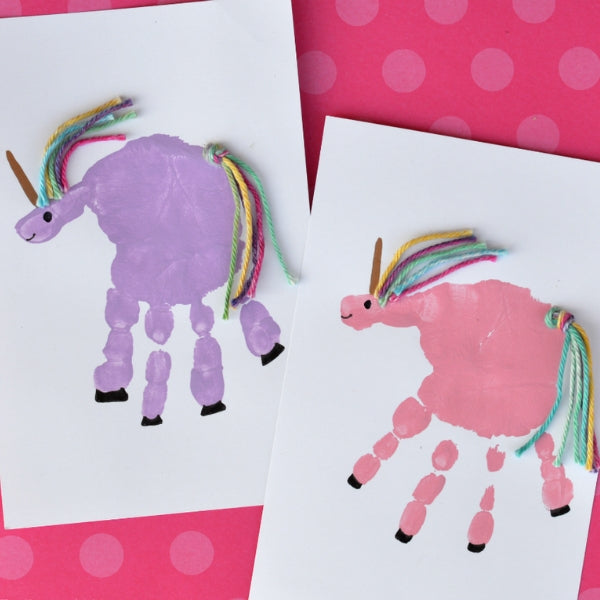 A unique unicorn handprint card as a cute mothers day card idea.