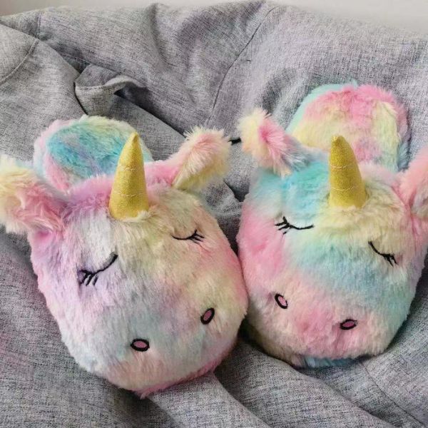 Delightful kids gleefully wearing their Unicorn Plush Slippers, these cozy and whimsical additions are the perfect Valentine's Gifts for Kids