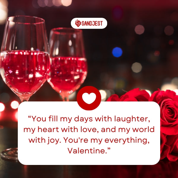 Two glasses of red wine and roses set for a romantic Valentine's Day celebration.