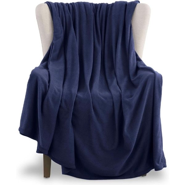 Plush queen-sized Vellux fleece blanket in a rich navy hue, a comforting Grandparents Day gift.