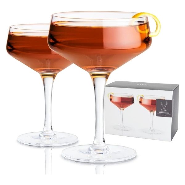 Exquisite Viski Raye crystal coupe glasses with angled stems, perfect for toasting on Grandparents Day.