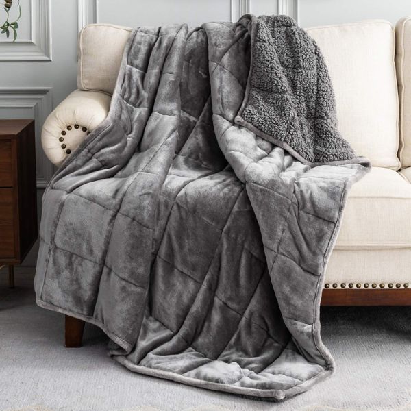 A cozy, weighted blanket, one of the many unique gifts for a stay at home mom, provides comfort and warmth.