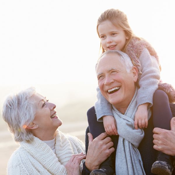 An image depicting a heartwarming moment between grandparents and their grandchild, embodying the spirit of Grandparent's Day