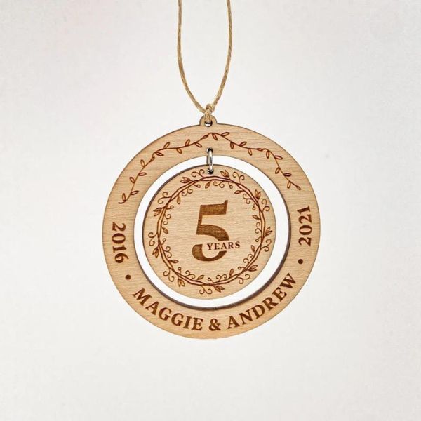 Wooden Laser Engraved Ornament, a personalized keepsake for a 5 year anniversary gift.