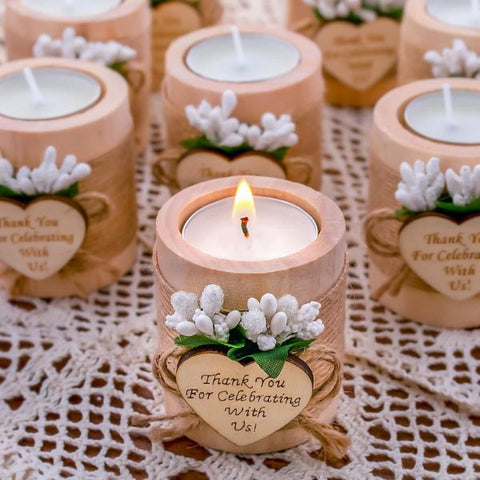 Rustic candle holders, a warm wedding favor.
