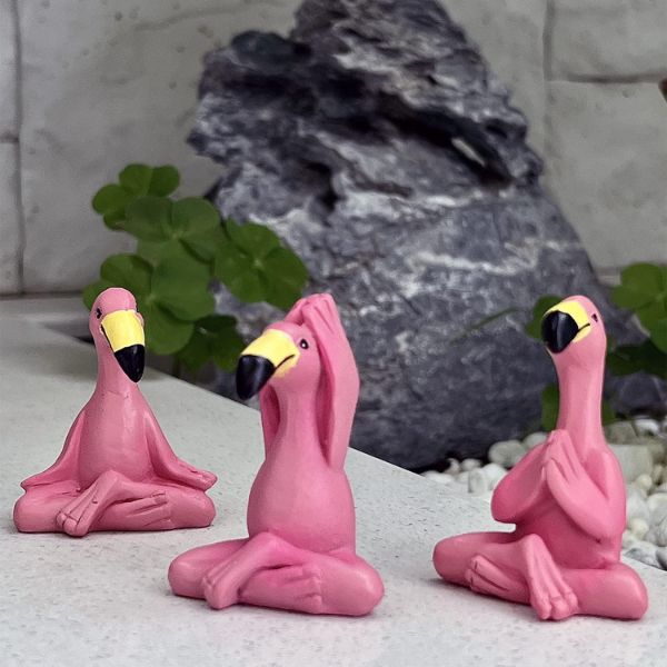 Yoga Flamingo Garden Decor brings tranquility and charm to your outdoor oasis.
