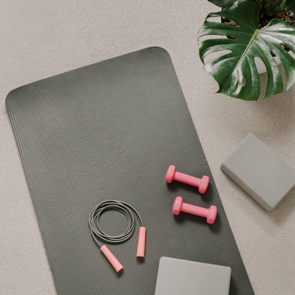 High-quality, non-slip yoga mat in a vibrant color, the perfect companion for single moms’ wellness practices.