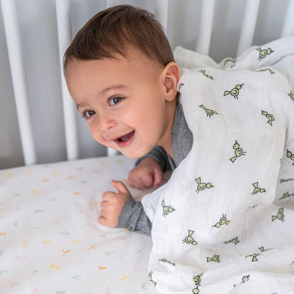 Wrap your baby girl in the comfort of aden + anais' Swaddle Blanket, an essential for sweet dreams and peaceful sleep.