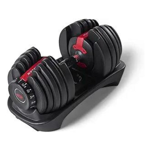 A single adjustable dumbbell on its stand, an ideal fitness gift for men celebrating their 40th birthday.