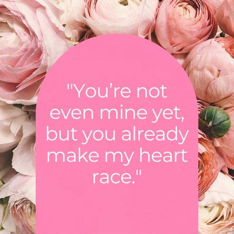 A romantic image with pink roses and a flirty quote about a racing heart, perfect for expressing budding affection.