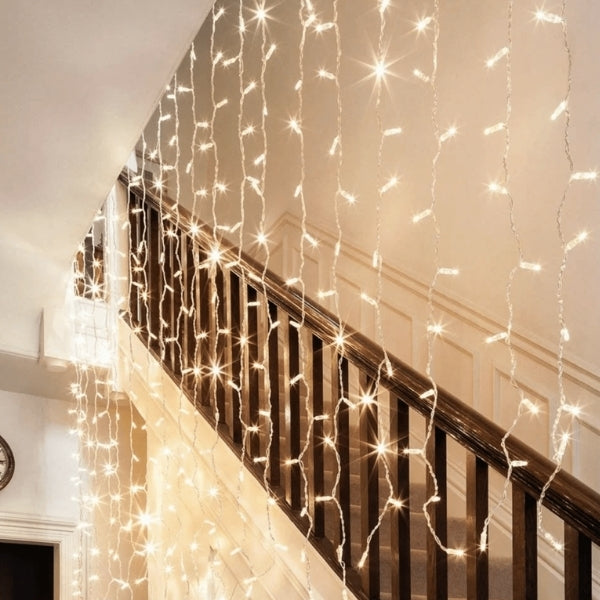 Hanging string lights across a room creates a magical atmosphere for decorating christmas lights ideas.