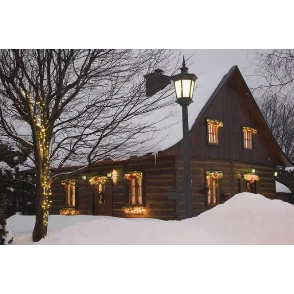 Light the side windows to bring a balanced glow to your home’s Christmas lighting tips.