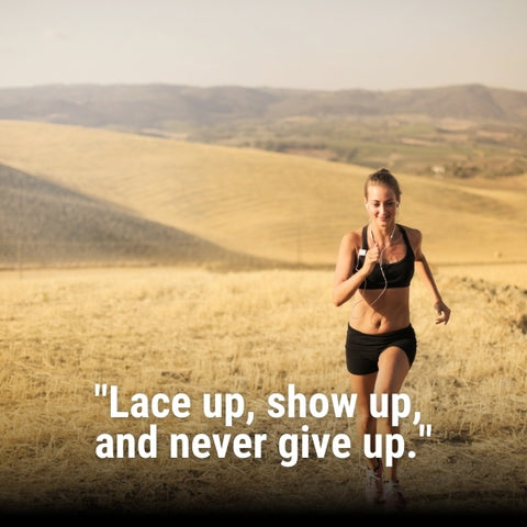 A woman runner's powerful form highlights the strength in motivational running quotes for women.