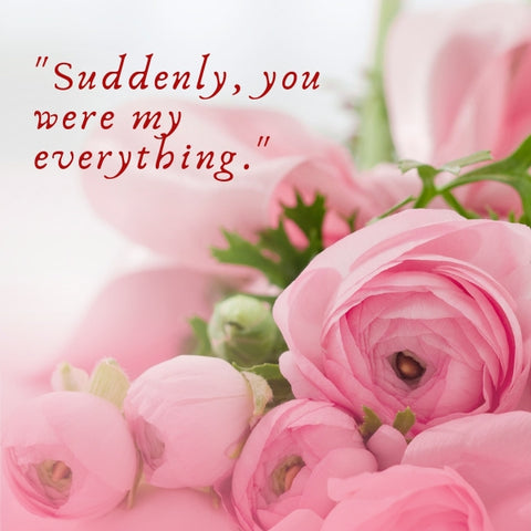 Soft pink roses accompany a short love at first sight quote.